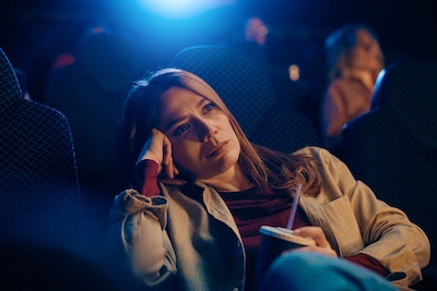 The sunk cost fallacy is why you stay in a movie theater watching a lousy film.
