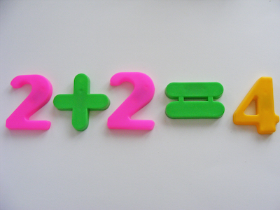 Two plus two is System 1 territory. Complex equations would be System 2.